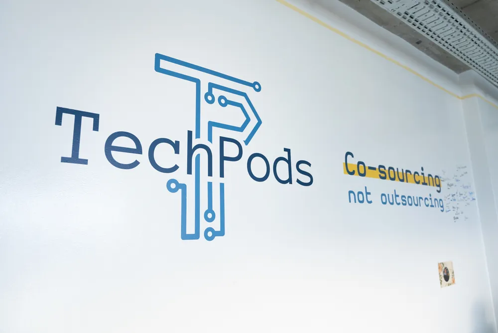 TechPods logo on wall